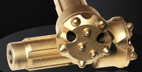 Low air pressure DTH drill bits